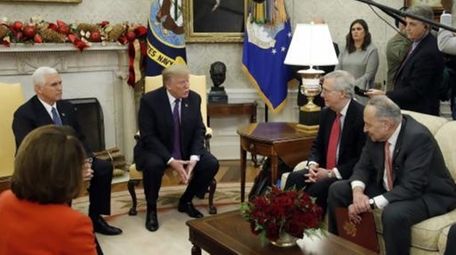 President Donald Trump accompanied by Vice President Mike