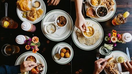 Overview of a table at Buxton Hall Barbecue.