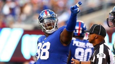 Damon Harrison of the Giants signals first down