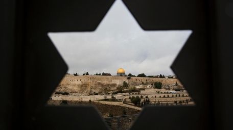 Jerusalem Old City is seen trough a door