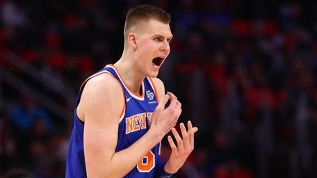 Knicks forward Kristaps Porzingis reacts thinking he was