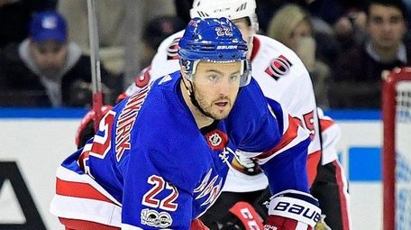 The Rangers' Kevin Shattenkirk carries the puck out