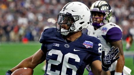 Penn State running back Saquon Barkley breaks free