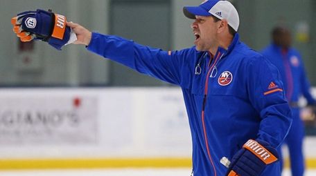 Islanders coach Doug Weight, shown at practice at