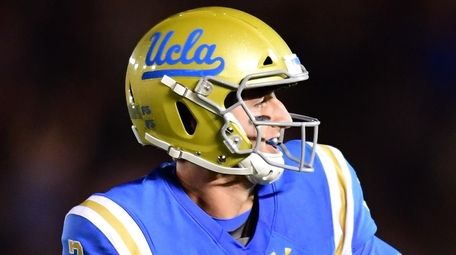 UCLA quarterback Josh Rosen celebrates a touchdown pass
