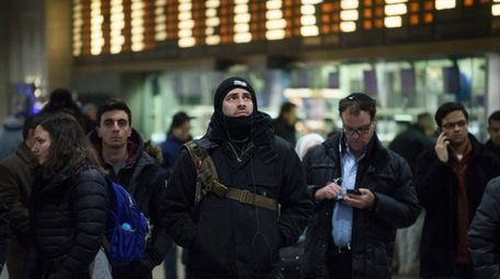 People wait for their tracks to be announced