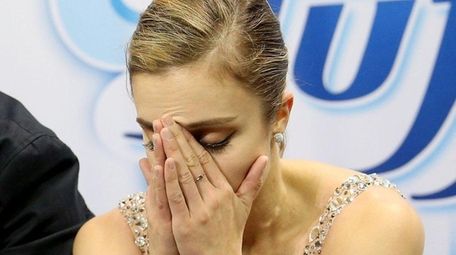 Ashley Wagner waits for her score in the