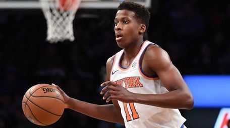 Knicks guard Frank Ntilikina brings the ball upcourt