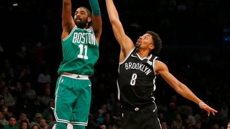 Kyrie Irving of the Celtics puts up a