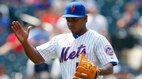 Mets pitcher Jenrry Mejia reacts during a game