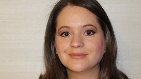 Elizabeth Usinger of Garden City has been promoted
