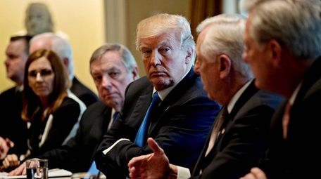 President Donald Trump meets with a bipartisan group