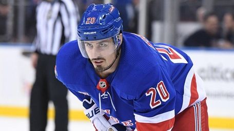 Rangers left wing Chris Kreider sets before a