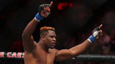 Francis Ngannou celebrates his victory over Alistair Overeem