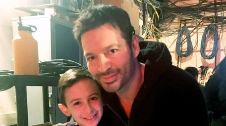 Kidsday reporter Henry Carbonell backstage with singer and