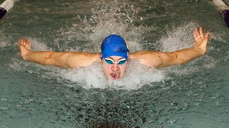 Hauppauge's Jack Casey wins the 100 yard butterfly