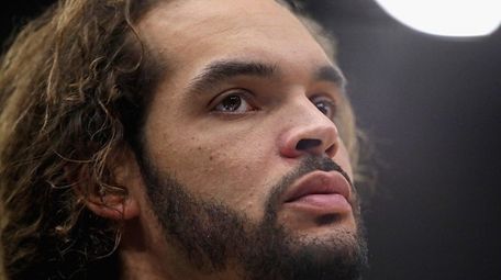 Knicks center Joakim Noah looks on during a