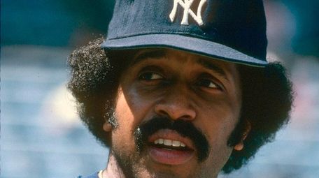Oscar Gamble of the Yankees looks on prior