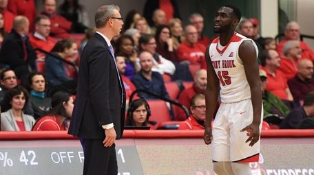 Stony Brook guard Akwasi Yeboah walks to the