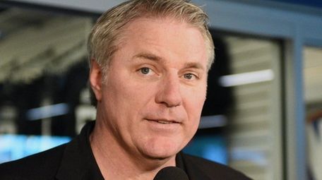 Islanders general manager Garth Snow answers questions from