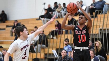 Julien Crittendon of Half Hollow Hills East attempts