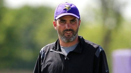 Vikings quarterback coach Kevin Stefanski watches practice during
