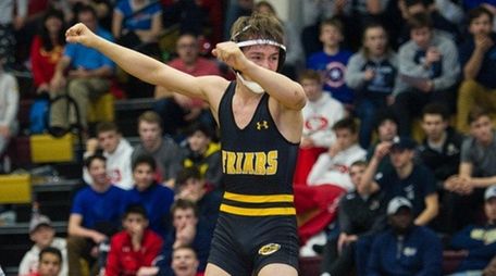 Christian Hansen of St. Anthony's faces Francis Finn