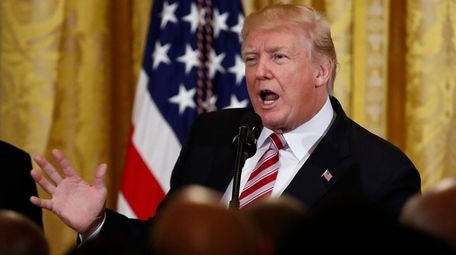 President Donald Trump speaks during the National African