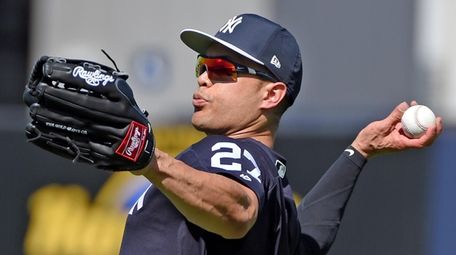 Yankees' Giancarlo Stanton works out during spring training
