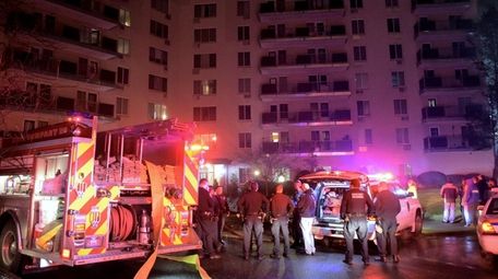 Firefighters respond to a blaze in an apartment