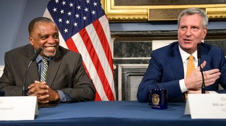 J. Phillip Thompson, left, was appointed Thursday as