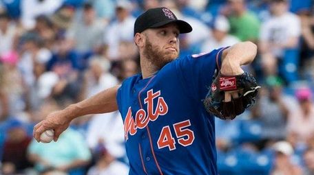 Mets pitcher Zack Wheeler throws the ball during