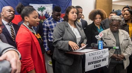 Assemblywoman Michaelle C. Solages speaks as community groups