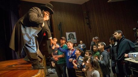 Hasidic rapper Nissim Back performs at a unity