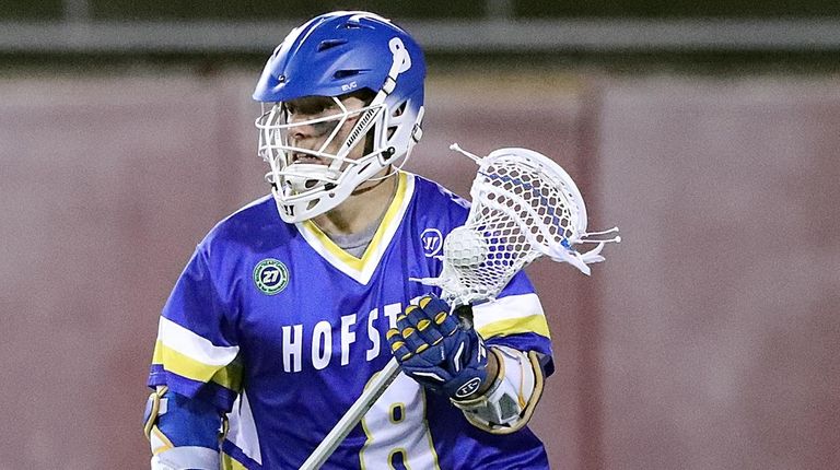 Hofstra's Jimmy Yanes drives from behind the net