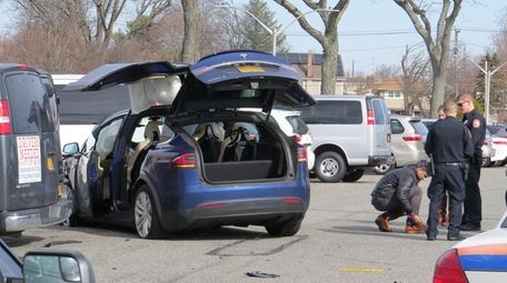 The scene of an accident involving a Tesla