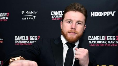 Boxer Canelo Alvarez poses during a news conference