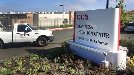 A vehicle drives into the Otay Mesa detention
