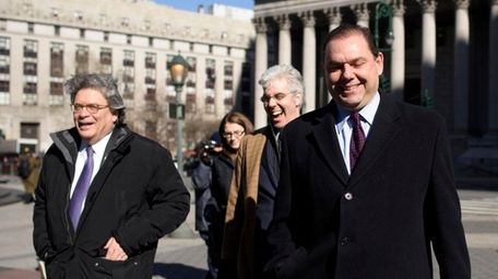 Joseph Percoco, right, exits a federal courthouse in