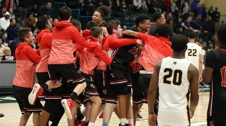 Half Hollow Hills East players react after defeating