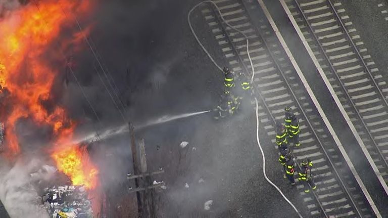 Fire breaks out near LIRR tracks in Queens; multiple lines suspended