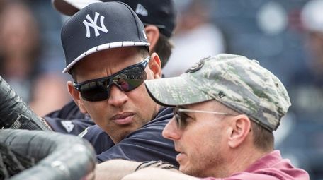Former Yankees third baseman Alex Rodriguez speaks with