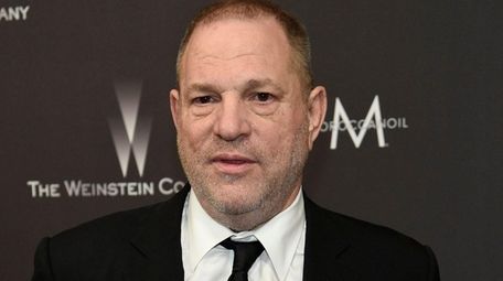 Harvey Weinstein arrives at The Weinstein Co. and