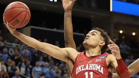 Oklahoma's Trae Young puts up a lay up