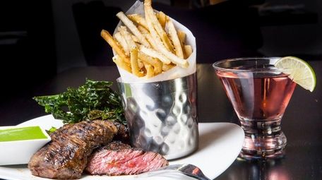 Skirt steak with truffle fries and roasted kale