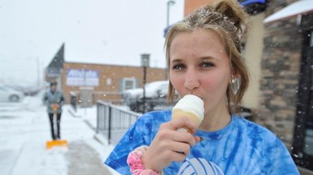 A high school student enjoys ice an cream