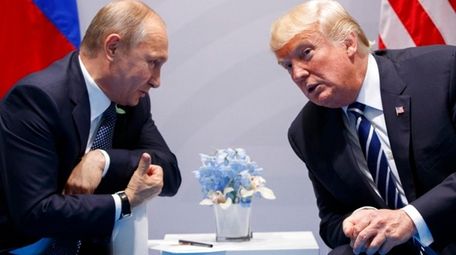 President Vladimir Putin meets with President Donald Trump