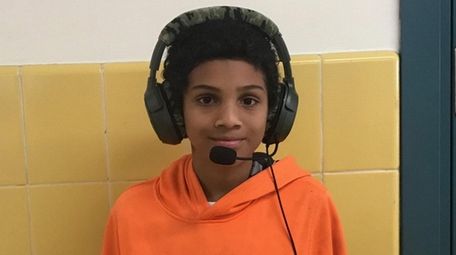 Kidsday reporter Aaron Thompson tests out the Ear