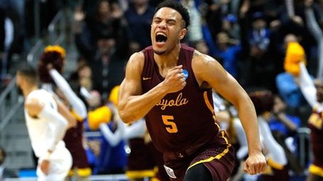 Marques Townes of the Loyola Ramblers reacts after