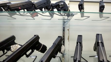 Guns on display at a gun store in